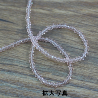 ボタンカットグラスビーズ 10ピーチ 3x2mm(1連/39cm)