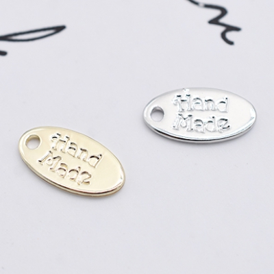 ミニチャーム ハンドメイドタグ メタルプレート 楕円形 1穴 6×12mm【20ヶ】