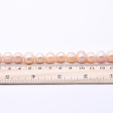 高品質淡水パールビーズ オーバル 天然素材 ベージュ  11-12mm【1連（約34ヶ）】