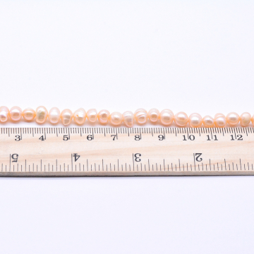 高品質淡水パールビーズ オーバル 天然素材 ベージュ 6-7mm【1連（約66ヶ）】