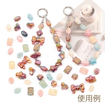 アクリルビーズ 猫の肉球 電気メッキビーズ オーロラ加工 縦穴あり 約14×18mm（8ケ）