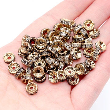 ロンデルパーツ ストーン付 スペーサービーズ メタルビーズ ゴールド 約3×7mm（約50ヶ）