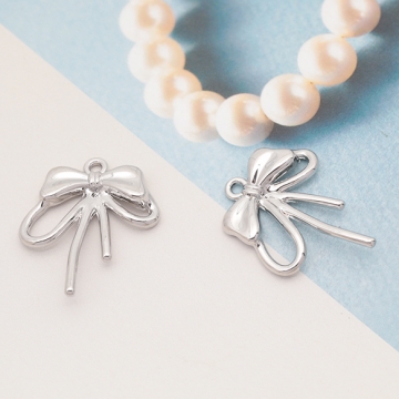 メタルリボンチャーム 立体りぼんチャーム ネックレス ピアス ストラップ制作におすすめ  1カン 約21×25mm （4ヶ）