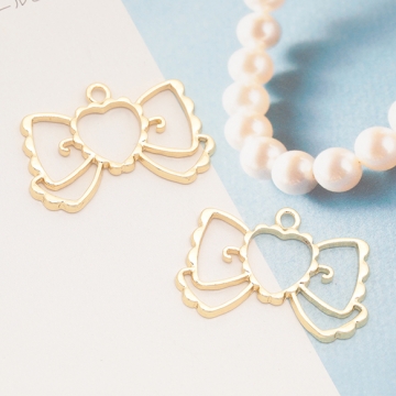 リボンチャーム りぼん 蝶々結び レジン枠 フレームチャーム メタルチャーム 約24×36mm（2ヶ）