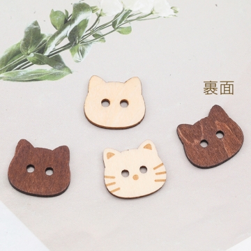 ウッドボタン ねこモチーフ 猫 二つ穴ボタン 木製 服飾パーツ 約16×18mm（10ヶ）