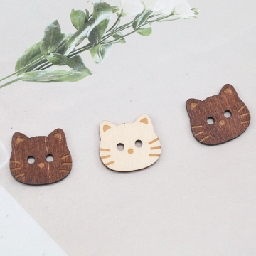 ウッドボタン ねこモチーフ 猫 二つ穴ボタン 木製 服飾パーツ 約16×18mm（10ヶ）